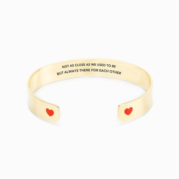 Not as close as we used to be but always there for each other heart bangle